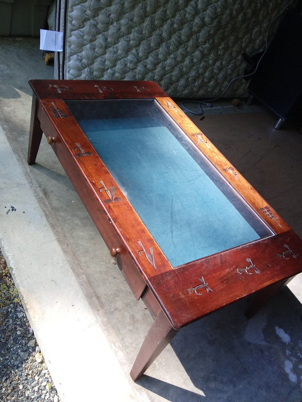 Coffee table solid wood with shadow box top had fishing lures carved around edges b great at lake house