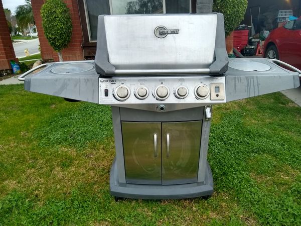 Blue ember BBQ grill with side burner, beverage & veg. Holder, attached