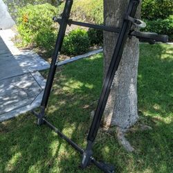 Thule square bar roof rack 50 inches wide, 2 Thule bike bars