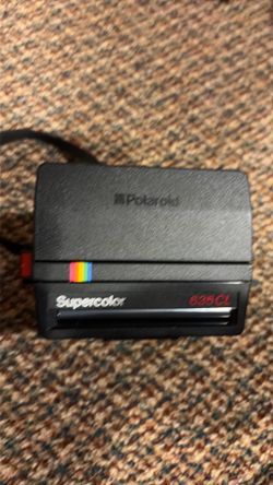 a Polaroid Supercolor 635CL,