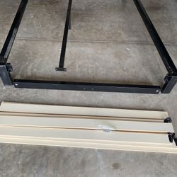 Queen Size Heavy Duty All Metal  W/Wooden Slates To Support Mattress. No Box springs Needed. Has Middle Metal Support For Added Support.