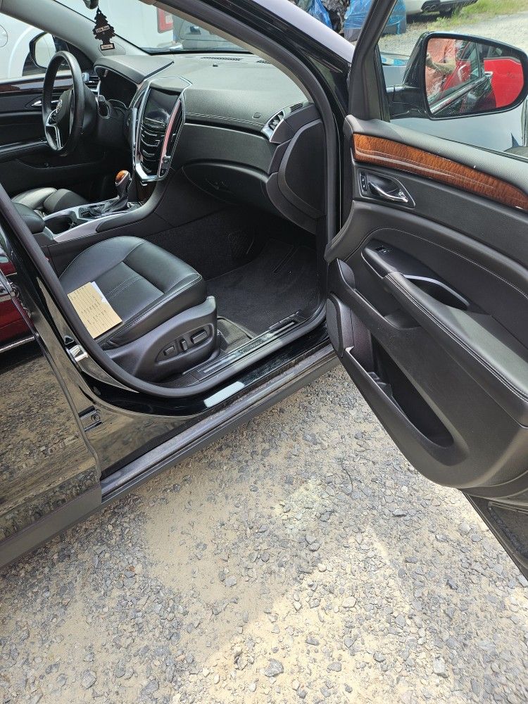 2016 Cadillac Srx. Premium Editiin.dual Sun Roof. Electric Mirrors. Heated And Cooled Steering Wheel. Heated And C ooled Seats. Boise Sterp With C.d M
