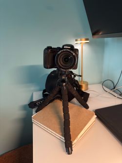Nikon COOLPIX camera with tripod, bag and strap