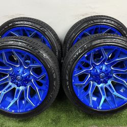 NEW 22x12 blue fuel wheels wrapped in 305/40r22 lexani tires 8 lug 8x6.5 bolt pattern