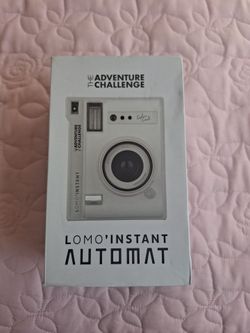 LOMOS' INSTANT AUTOMAT