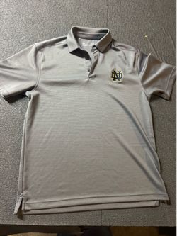 Under Armour Notre Dame gray polo shirt with subtle horizontal stripes, size M