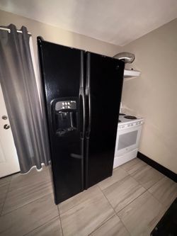 Black Maytag plus fridge