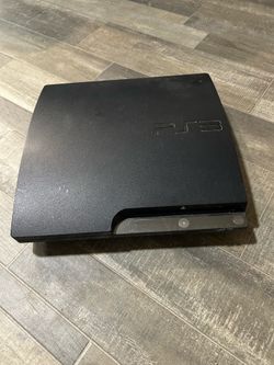 PlayStation 3 console.  Not working.  For parts
