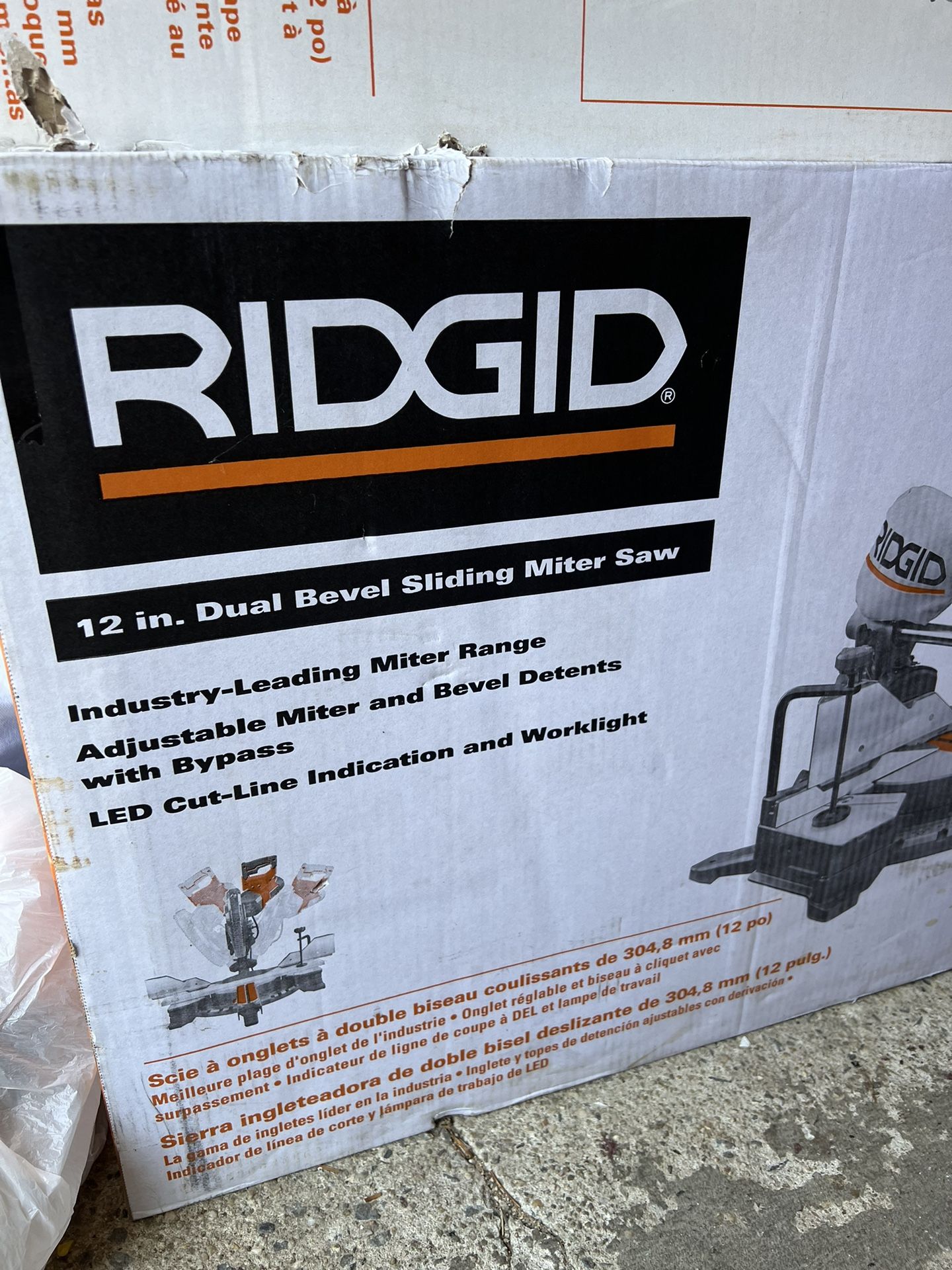 NEW- Rigid 12in. Dual Bevel Sliding Miter Saw With Stand