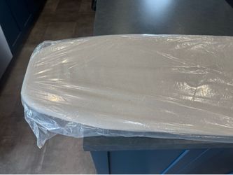 Ironing Board—attaches to wall