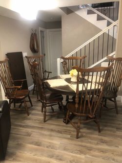 Claw feet 52” round table with 24” leaf to make it 76” oval and 6 chairs