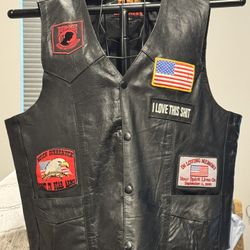Hot Leathers Vintage XL Men's Motorcycle Snap Front Vest with Patches. 22” pit to pit. Includes large Bald Eagle patch on the rear of the vest as well