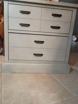 TWO matching bedside dressers
