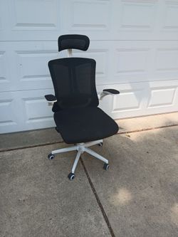 Black and white office chair adjustable