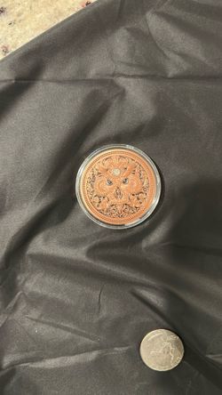 Copper owl coin