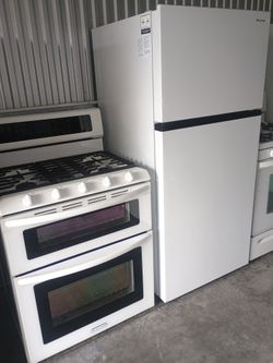 Kitchen Aid Stove and Hisense Refrigerator