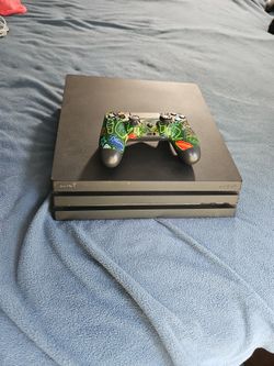 PS4 with Games & Controllers