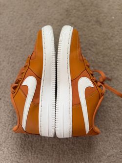 Nike Air Force 1 Orange Low-Top Sneakers