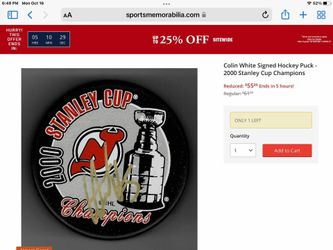 Colin White signed hockey puck from 2000 Stanley Cup championships