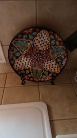 Artistically painted ceramic plates