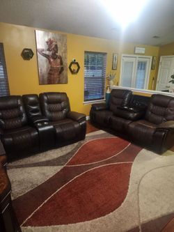 Dark Brown Leather Reclining Sofa and Loveseat Set
