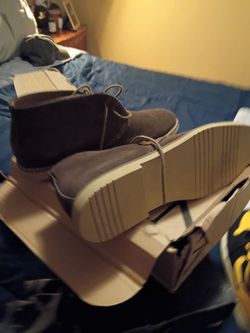 two pair of very nice sneakers barely worn and a nice pair of banana Republic suede boots. yellow sneakers 10 and 1/2 Nike Air 11s that would be the b