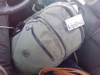 Kipling  back pack grey brand new  134$ retail