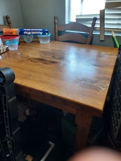 Solid oak dining table with chairs