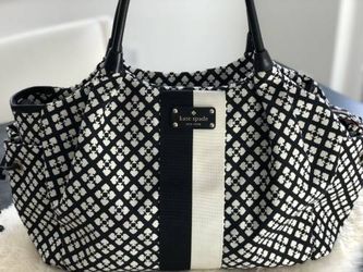 Kate Spade New York Stevie Diaper bag Tote Black & White exterior. Red interior