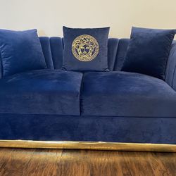 A Pair Of Versace Sofas Gently Used.