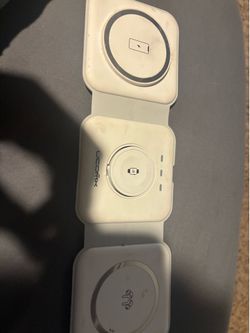 White charger for airpods phone and apple watch