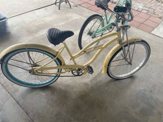 yellow Dyno Deluxe 26-inch beach cruiser with a springer fork.
