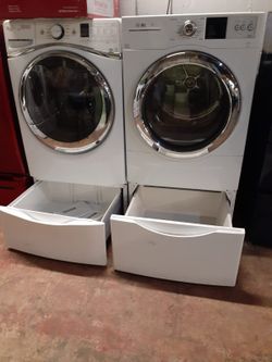 Mix and match front load washer and dryer set with pedestal working perfectly with 4 months warranty