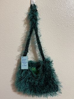 Purses, hand knit, with a sewn in liner