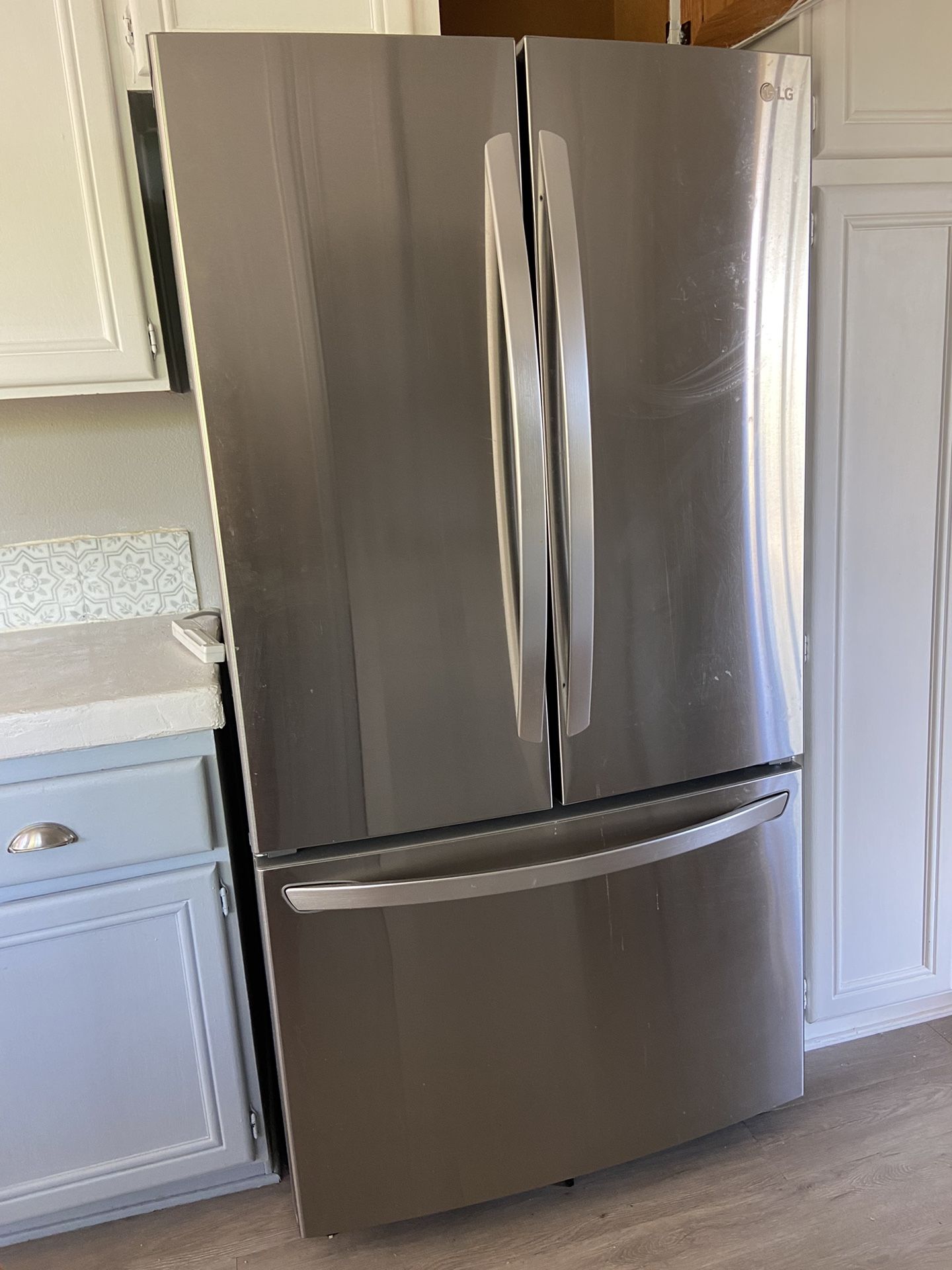 LG Electronics 23 cu. ft. 3-Door French Door Refrigerator with Glide N' Serve in PrintProof Stainless Steel, Counter Depth