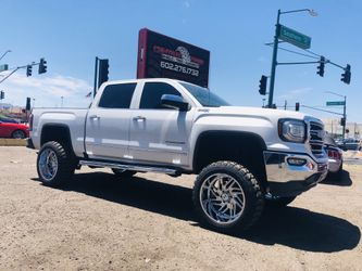 22x12 chrome Hostage wheels on 35” Tires . Central Tires