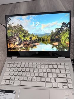 HP Pavilion x360 touch screen laptop with fingerprint sensor
