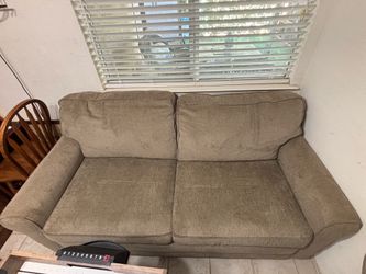Brand new couch with full size pull out bed