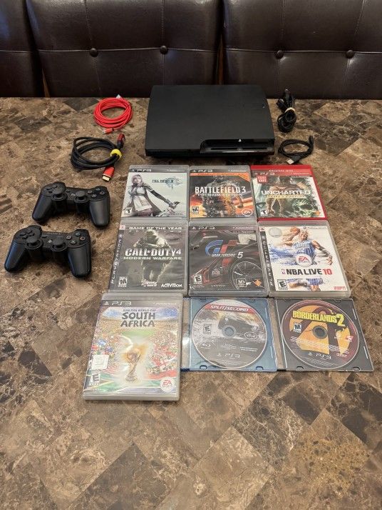 Sony Playstation 3 PS3 + 500 GB Hard Drive with 40+ Games pre installed + 2 Controllers
