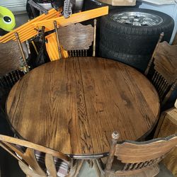wooden kitchen table with leaf with four chairs