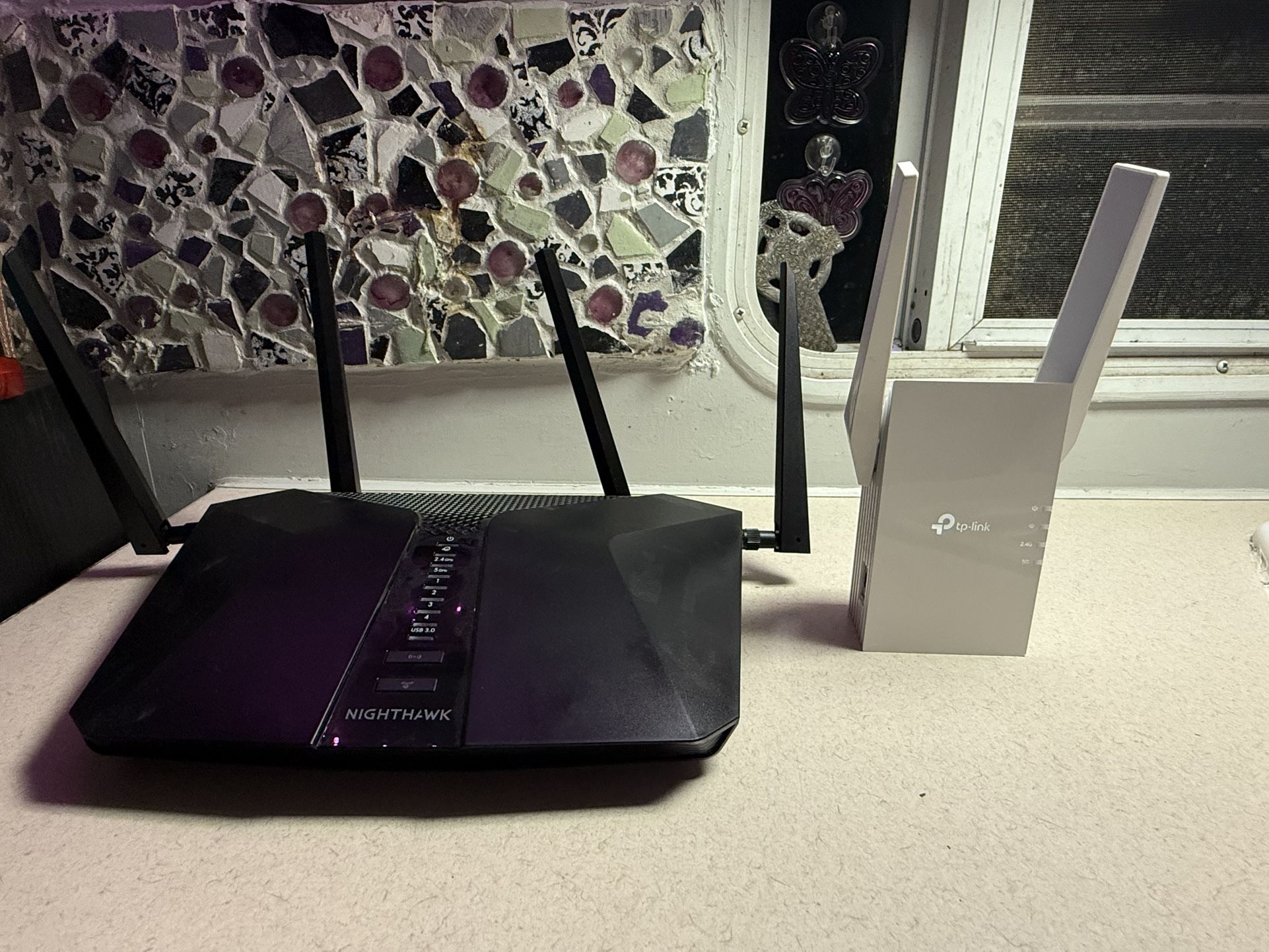 Nighthawk AX5400 Dual Band WiFi 6 Gaming Router & TP Link Range Extender