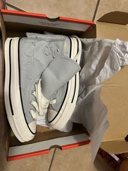 Converse Chuck 70 High Top sneakers in a "Rainwashed Grey"