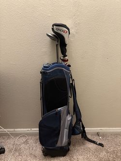 Assorted golf clubs