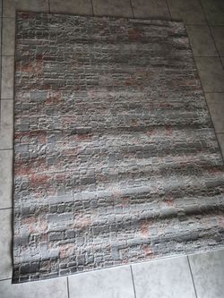 Rug/ Alfombra $25