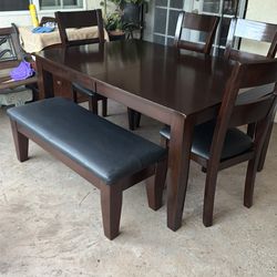 Dining table and 4 Chairs one bench