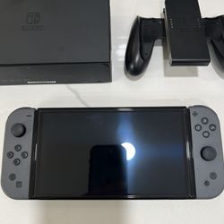 Nintendo Switch OLED Console with Gray Joy Con Controllers