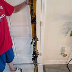 Beautiful Skis with poles and boots for sale