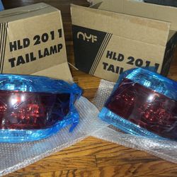 Brand new aftermarket right-side tail light for 2011–2013 Toyota Highlander or Tacoma. Never installed, still in factory packaging. Pickup only, no sh