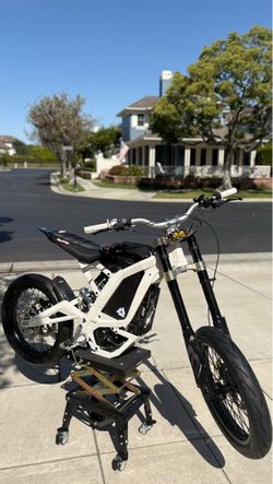 FULLY built Surron 4 miles on it need gone ASAP