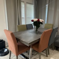 Stylish Dining Table with 6 Chairs - $400